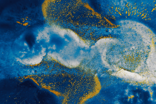 A captivating blend of blue and yellow hues forming a cloud, evoking a sense of wonder and tranquility.