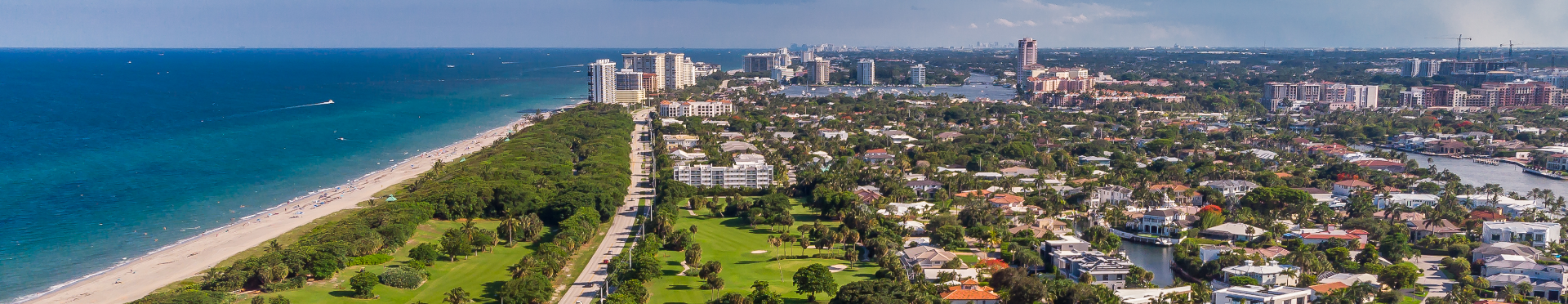 McDermott Will & Emery law firm’s Boca Raton office, specializing in tax and estate planning (image shows an aerial view of the Boca Raton skyline and ocean shore; Credit: Getty Images)
