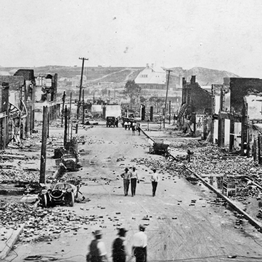 Archival photo of Tulsa's Greenwood community after the 1921 Tulsa Race Massacre