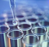 Close up of examining of test sample (source: Getty Images)